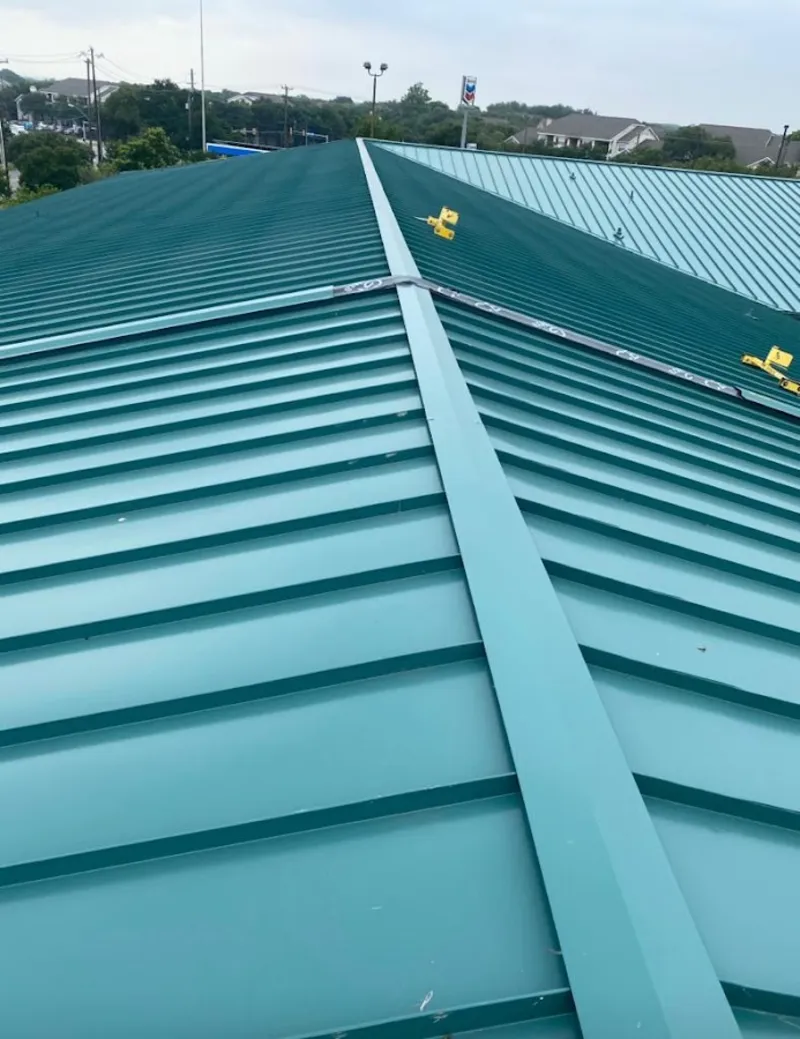 Green commercial metal roof ridge and valley for Metal Roof Repair in Upper Providence